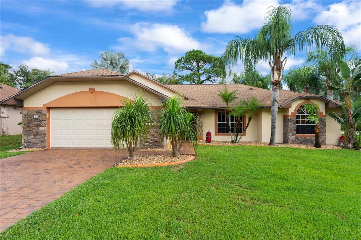 Welcome to the truly one-of-a-kind neighborhood of Riverwood Plantation. The community amenities make you feel like you're living in a coastal resort. Included in the $258 quarterly dues are a private boat ramp with access to the Intracoastal Waterway, a fishing pier with cleaning stations, pickleball, tennis, basketball, and racquetball courts, a clubhouse, a large community pool, and multiple playgrounds—all within walking distance of this beautifully updated home.
From the moment you arrive at 6225 Ranier, you'll appreciate the spacious corner lot featuring tropical-themed landscaping and custom concrete curbing. Inside, you're welcomed by a large kitchen equipped with 42-inch wood cabinets, brand-new appliances, and a cozy dining area.
The expansive open floor plan is perfect for entertaining, offering flexibility in arranging your dream living space. For additional living space, enjoy the Florida room—designed with tropical decor to complement the lush surroundings.
The owners recently remodeled the master bathroom, transforming it into a spa-inspired retreat. It features an impressive walk-in closet with custom cabinetry for organized storage. The oversized master bedroom, measuring 21 feet in length, offers enough space to create a stylish lounging area.
On the opposite side of the home, down a private hallway, you'll find the second full bathroom and generously sized guest bedrooms.
Outdoor living is essential in Florida, and this tropical backyard does not disappoint. Enjoy a private, paved entertaining area perfect for gatherings and relaxation.
Come make this beautiful house your home and start living the Florida lifestyle.