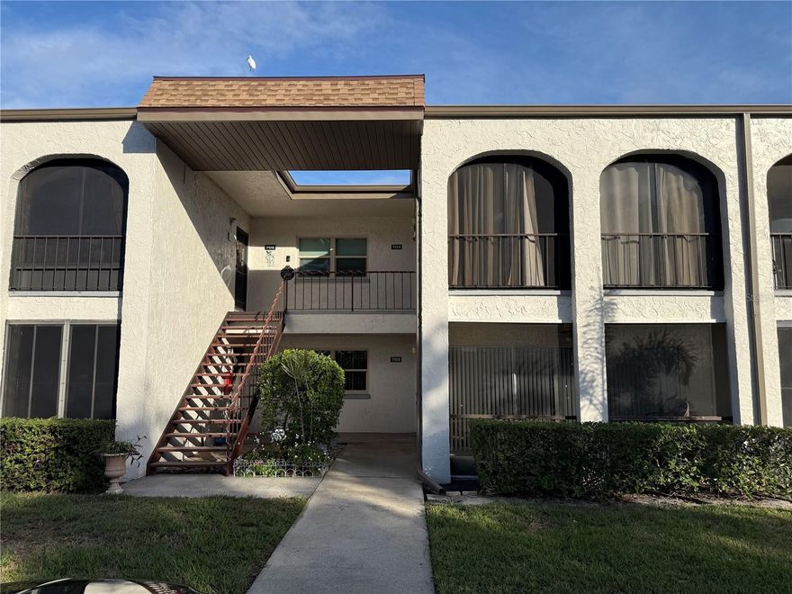 FURNISHED GROUND FLOOR STUDIO UNIT. Move right in. Recently replaced Electric panel, refrigerator and kitchen cabinets. Furnishings include Murphy Bed, sofa, tables and chairs, TV and Microwave. Screened front porch provide true Florida lifestyle. This unit's parking space is conveniently located right in front of the unit. Just steps away from the complex clubhouse, pool and lots of outdoor activities. Economic living at a GREAT VALUE!