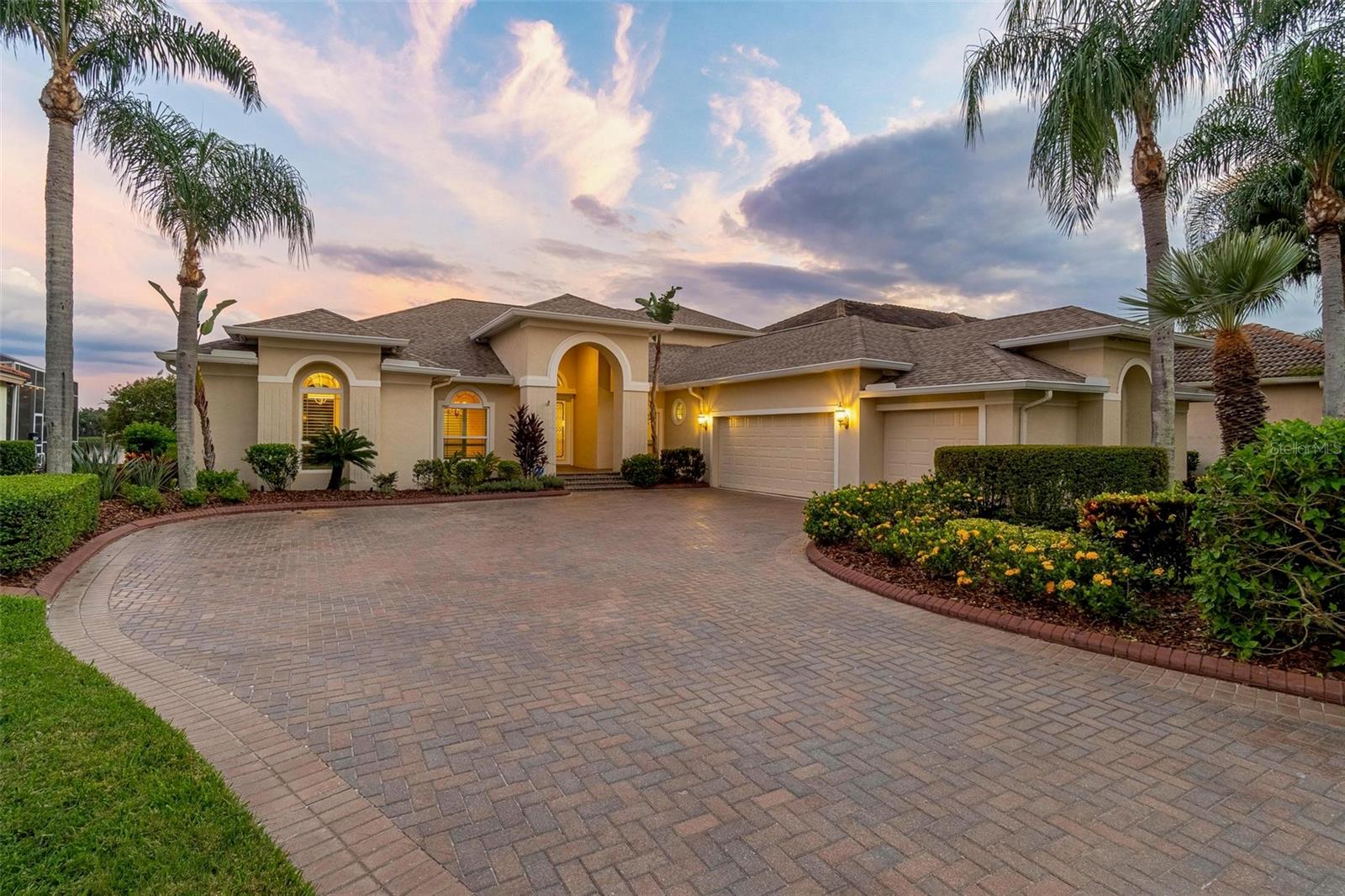 Welcome to 10521 Bermuda Isle Drive, an exquisite 4-bedroom, 4-bathroom home nestled in the prestigious Cory Lake Isles of Tampa, Florida. Boasting 3,731 square feet of luxurious living space, this residence is situated on the expansive section of Cory Lake, offering breathtaking water views and direct lakefront access.
Step inside to discover a home that marries elegance with modern updates. The property has received over $250k in enhancements, including a new roof in 2021, three efficient AC units (two installed in 2017 and one in 2023), and all-new hurricane impact windows, doors, and garage doors from 2019, newly updated pool and spa heaters, also from 2019.
The interior impresses with amazing dual pocket doors in the living area allowing the outside in, expansive tile flooring throughout, a home office with custom built ins, a downstairs secondary en suite bedroom, and a beautifully updated primary suite with spacious bath and dual walk in closets. Enjoy cooking in the well-appointed kitchen, complete with a huge walk in pantry and contemporary stainless steel applicance and granite counters. The spacious rooms flow seamlessly, providing ample space for entertaining or unwinding.
Outside, the private pool invites you for a swim, with both pool and spa heaters (all conveniently controlled from your phone) and brand new hurricane rated pool cage with minimal bars offering amazing views of the lake. Sitting on a huge lot as well offering plenty of backyard fun at .41 acres. This home truly embodies the Florida lifestyle and is ready to welcome new owners who appreciate the perfect blend of comfort and entertainment. Cory Lake Isles features a 165 acre ski lake, resort style pool, amazing clubhouse with gym, basketball court, tennis courts, outdoor roller hockey, sand volleyball court, beach side playground. Bring your boating toys for all the fun!