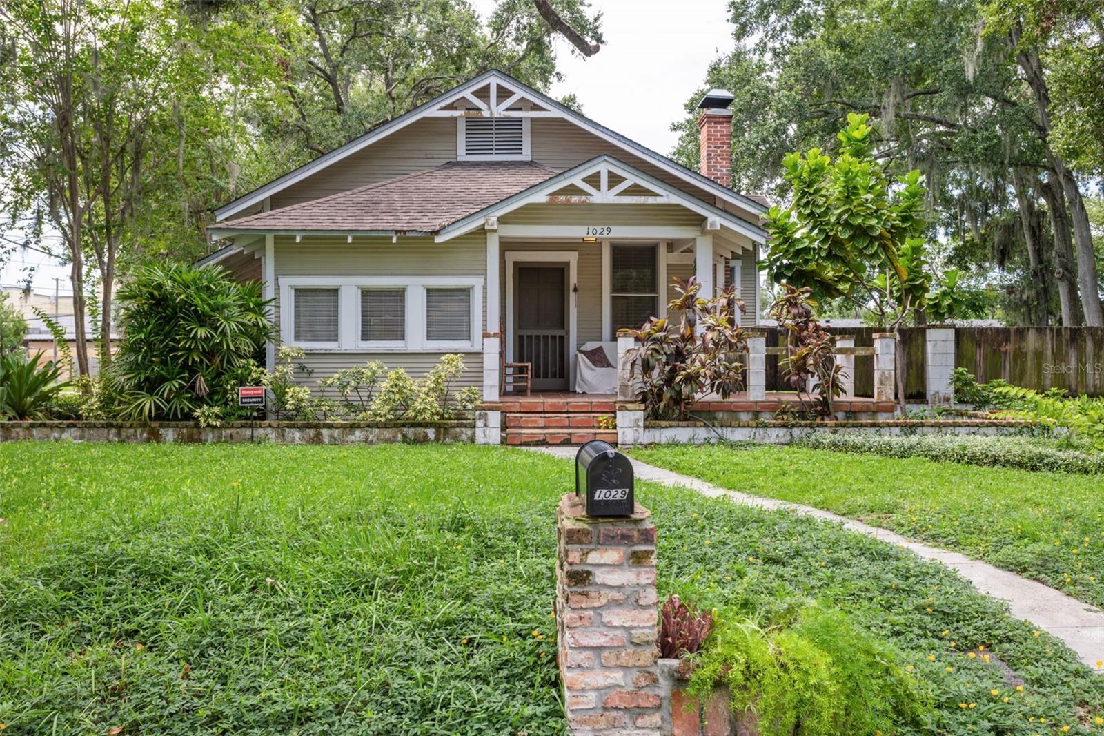 Step into the charm of the 1930s with this cozy two-bedroom, one-bath bungalow nestled in the heart of Hampton Terrace. If you’ve been dreaming of a home with character and space to make it your own, this spot might just be calling your name. Sitting on a generously sized lot, there’s room to garden, add on, or build that backyard hangout you've always wanted. Seriously—the only limit is your imagination (and maybe a zoning permit or two).Inside, you'll find just over 1,000 square feet of living space—enough room to stretch out without needing a map to find the kitchen. Speaking of which, the large screened-in patio adds an extra dash of charm… and there’s a fun little surprise out there that’s sure to spark some conversation.Location-wise, you’re right near all the action. Some of the neighborhood favorites include Duff’s Famous Wings (pure comfort food gold), Hampton Station Pizza and Records (pizza and vinyl, need we say more?), and Publix just up the road for those mid-week snack runs.This home is perfect for anyone looking to enjoy the Seminole Heights vibe while putting their stamp on a piece of Tampa history. With solid bones and plenty of space to upgrade, it's a great opportunity for both first-time buyers or seasoned renovators ready for their next project. Come see what this classic bungalow has to offer—you might just fall in love with the potential.