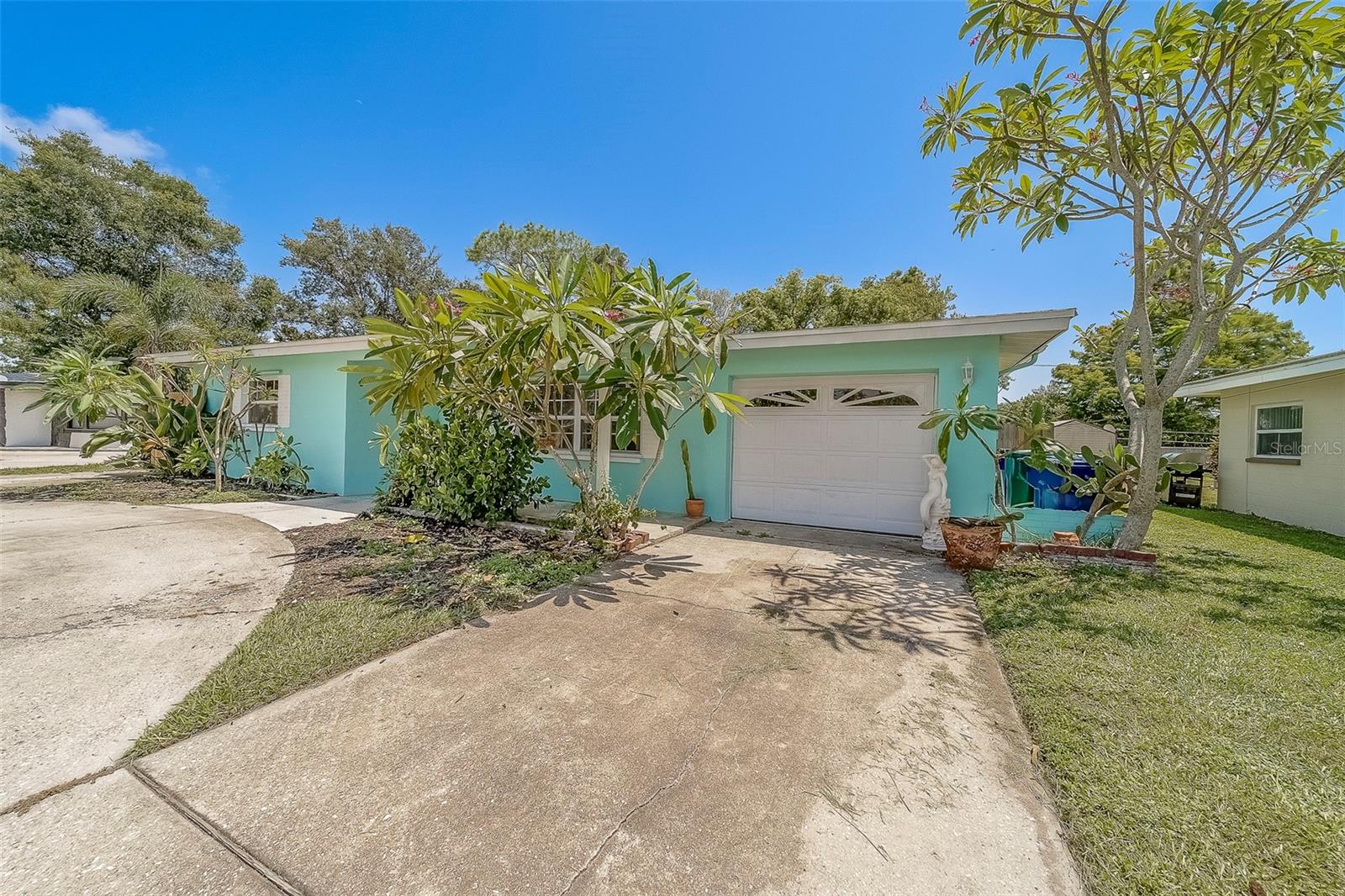 Under contract-accepting backup offers. Florida living at its finest! This beautifully maintained 3-bedroom, 2-bathroom block construction POOL home, in desirable unincorporated Seminole, offers the perfect combination of comfort, privacy, and convenience. Situated on a spacious lot with mature landscaping and a peaceful pond view, this home is a true retreat just 5 minutes from the sandy shores of Madeira Beach.
Inside, you'll find a bright and open floor plan filled with natural light, creating a warm and welcoming atmosphere. The seamless flow between the kitchen, dining, and living areas makes this home ideal for both everyday living and entertaining. Step outside to enjoy your private pool, resurfaced last year, along with a newly rescreened pool enclosure, perfect for relaxing or hosting friends and family year-round.
The home features a circular driveway and one-car garage, providing ample parking and curb appeal. With solid block construction, custom hurricane shutters, and a location outside of any flood zone, flood insurance is not required. This property has never experienced hurricane damage or flooding, offering added peace of mind.
Conveniently located near everything, you're just five minutes to the beach, 15 minutes to vibrant Downtown St. Pete, 15 minutes to Clearwater/St. Pete Airport, and only 30 minutes to Tampa International Airport. Shopping, dining, and entertainment are all just around the corner. Whether you're searching for a primary residence, vacation getaway, AirBNB or investment property, this home offers it all in one of Florida's most desirable coastal communities.
*Home is being sold As-Is. All room dimensions are approximate and should be verified by buyer.