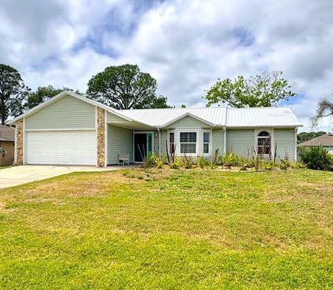 Photo of 2720 Banyan Drive, Edgewater, FL 32141 (MLS # O6392794)