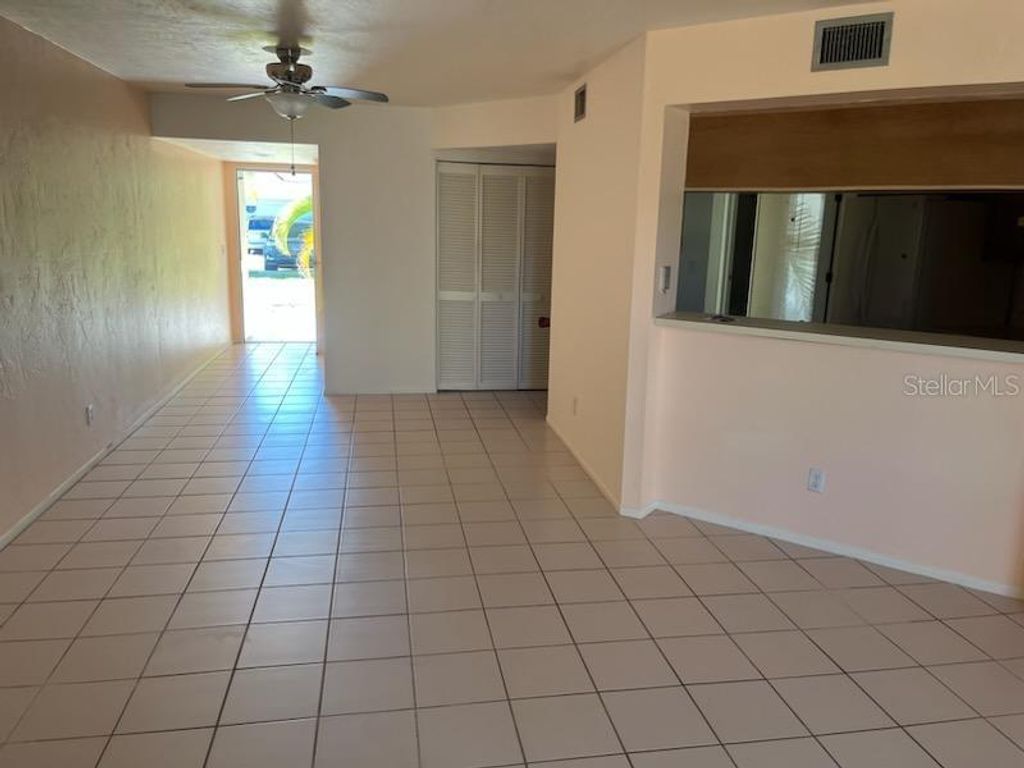 Photo of 9627 Eaton Gardens Lane #103, Fort Myers, FL 33919 (MLS # TB8478501)