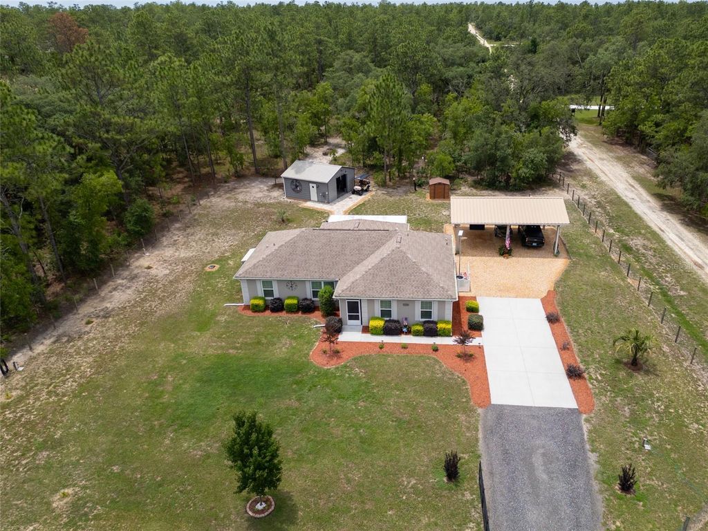 Photo of 12368 SW 81st Street, Dunnellon, FL 34432 (MLS # OM725571)