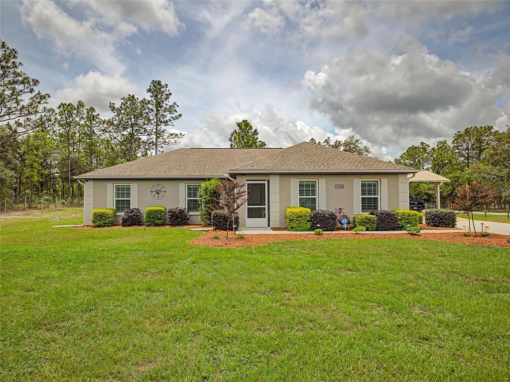 Photo of 12368 SW 81st Street, Dunnellon, FL 34432 (MLS # OM725571)