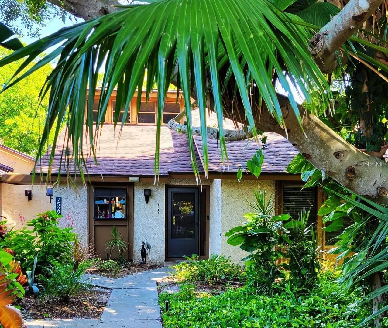 This tropical oasis is just minutes from the famous Anna Marie Island, with great fishing, unique dining, shopping, and entertainment. Enjoy the wonderful beaches of Anna Marie Island, Coquina Beach, Longboat Key, and secluded Bean Point Beach. Updated 2 bedroom/2 bath, with 3rd Bedroom Loft, is located in the maintenance-free community of Pine Bay Forest. The owner is motivated and is selling it fully furnished (less personal items and artwork). Bring your bathing suit and toothbrush, and you are all set to enjoy this relaxing lifestyle. The unit is surrounded by lush and tropical landscaping and is within biking distance to restaurants, shopping, a public transportation line, and Anna Maria Beach. The updates include a newer kitchen, counters, stainless appliances, and the guest bathroom, which has just been remodeled. The great room has an open floor plan, vaulted ceilings, sliders opening to the oversized screened lanai, and a spiral staircase that ascends to the loft. Covered parking, as well as guest parking, is only steps away. Enjoy relaxing in the pool and spa after playing tennis or pickleball on the court. Text 172494 to 46835 for additional information