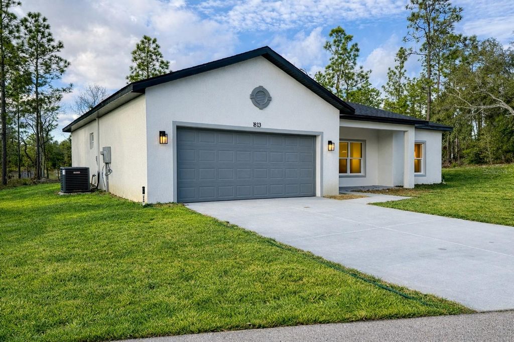 Photo of 1813 W Hialeah Drive, Citrus Springs, FL 34434 (MLS # O6382872)