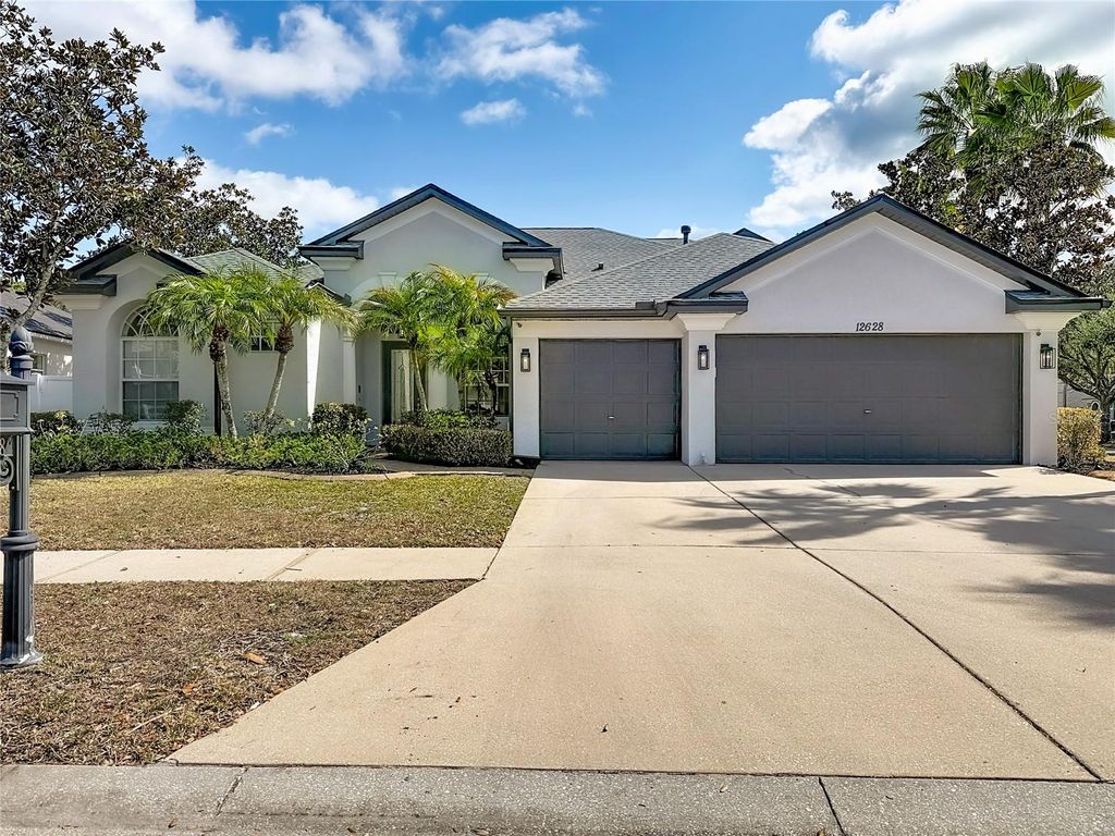 Photo of 12628 Stanwyck Circle, Tampa, FL 33626 (MLS # TB8475635)