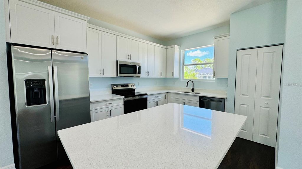 Photo of 14108 Chesswood Lane, Port Charlotte, FL 33981 (MLS # O6371117)