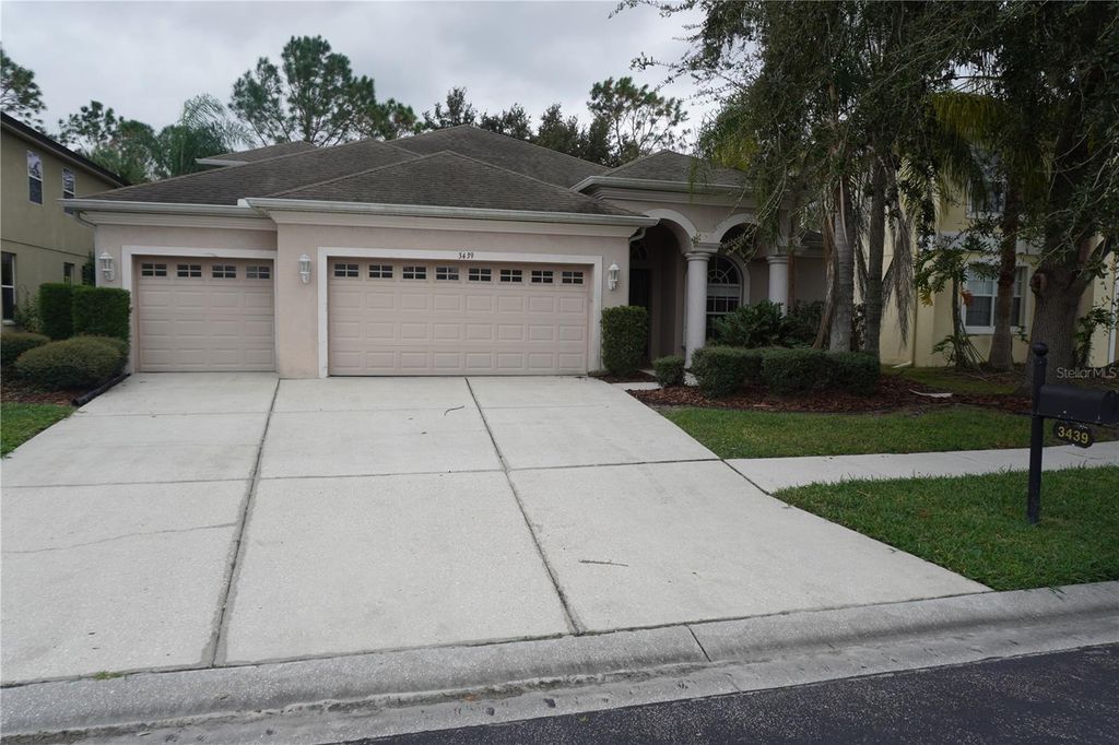 Photo of 3439 Hickory Hammock Loop, Wesley Chapel, FL 33544 (MLS # TB8437484)