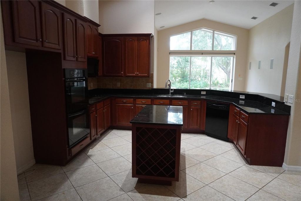 Photo of 3439 Hickory Hammock Loop, Wesley Chapel, FL 33544 (MLS # TB8437484)