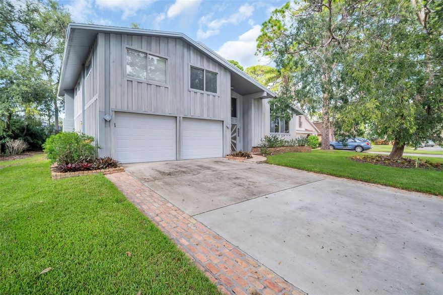 Owned and loved by a single family for over 50 years, this mid-century styled Seminole masterpiece is on the market for the first time since it was built.  Three bedrooms, 3 full bathrooms, a primary closet to-die-for, this 2,780 square foot home is filled with elegance and personality.  

You enter the split-level home into a giant foyer then up to a living and dining room with soaring ceiling and massive windows overlooking magnificent mature trees and landscaping. The nicely appointed kitchen has Frigidaire Gallery Stainless appliances, a breakfast bar and tile countertops. The lower level has a huge family room complete with a stone fireplace, perfect for game days, movie nights and family entertainment in between. Step outside onto the pavered lanai with a huge in ground pool, protected by a two-story screened enclosure.

Upstairs are three generous sized bedrooms, including a primary suite and second bathroom for easy family living.  Need extra room for your regalia?  The shoe-store sized primary closet awaits you and your inventory.

Located on a cul-de-sac among mature landscaping, the home is in the highly desirable Whispering Pines Forest section of Seminole and is close to schools, shopping and beaches. 

ROOF 2018 / HVAC (2 units) 2023 / WATER HEATER 2018