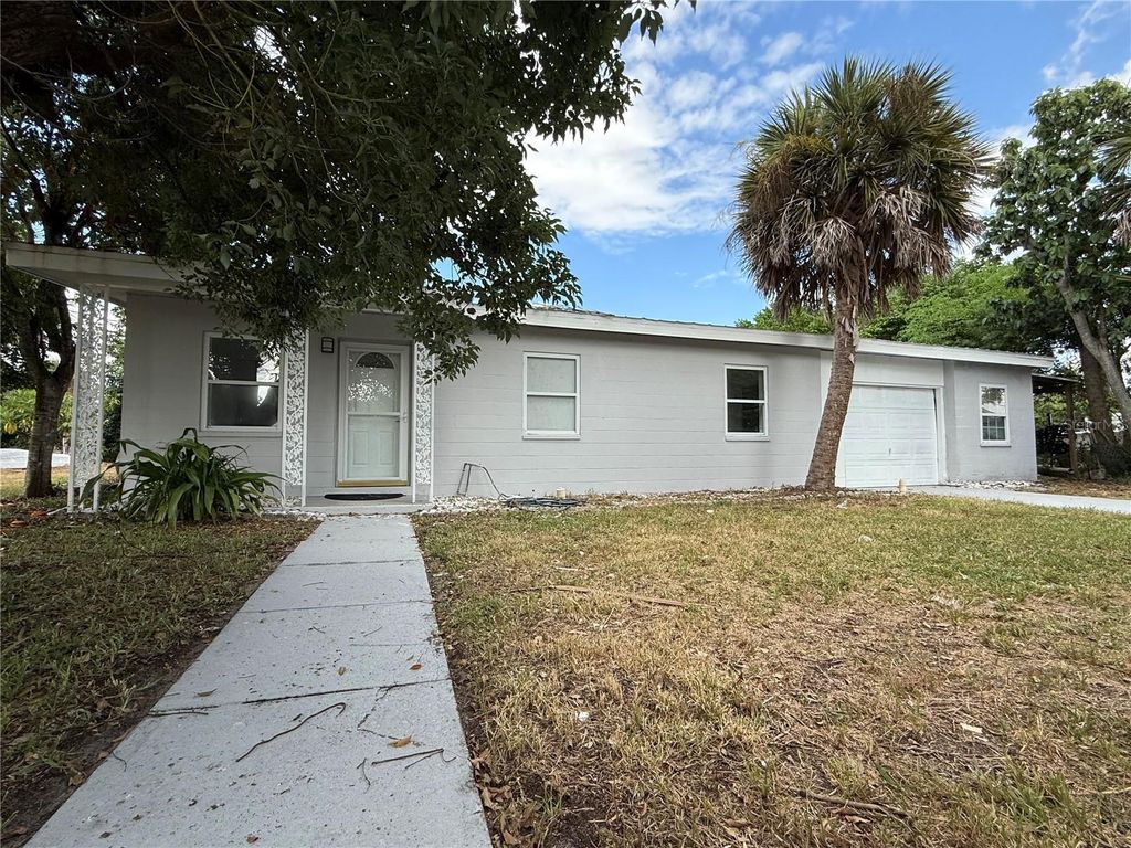 Photo of 203 Waterway Circle NE, Port Charlotte, FL 33952 (MLS # C7515677)