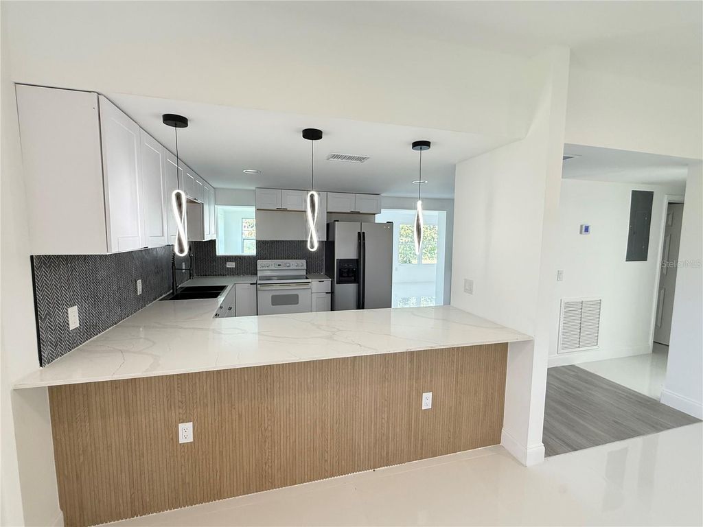 Photo of 203 Waterway Circle NE, Port Charlotte, FL 33952 (MLS # C7515677)