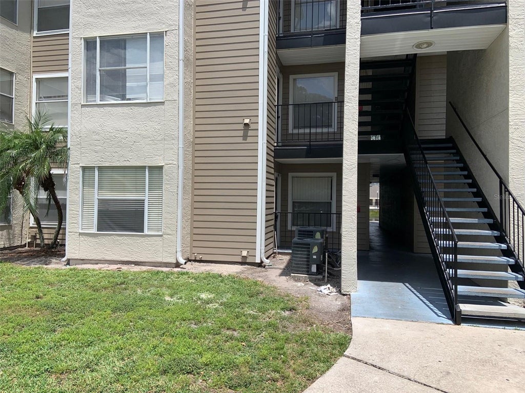 Photo of 4752 Walden Circle #715, Orlando, FL 32811 (MLS # O6439840)