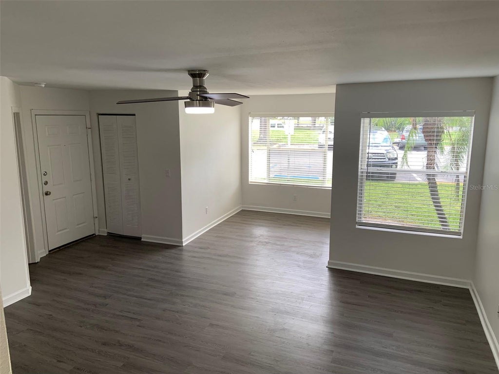Photo of 4752 Walden Circle #715, Orlando, FL 32811 (MLS # O6439840)