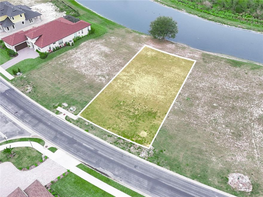 Discover the perfect opportunity to build your dream home in the prestigious gated community of Water Ridge in Auburndale, Florida. This .21-acre vacant lot offers serene drainage canal views, ensuring backyard privacy and tranquility. The adjoining 25' drainage easement provides an additional buffer on the south side of the neighboring property, enhancing lot. Water Ridge is designed to embrace Florida's sunny weather, featuring three beautiful pools, four lighted tennis courts, scenic walking trails, an expansive recreational field, and convenient access to boating ramps. Water Ridge offers boat storage and a community dock to drop boat in Lake. Enjoy a variety of water activities year-round, making it an ideal location for families and outdoor enthusiasts. Don't miss out on this incredible opportunity to create your custom home in the sought-after Water Ridge community. Act now and start living the Florida lifestyle you've always dreamed of!