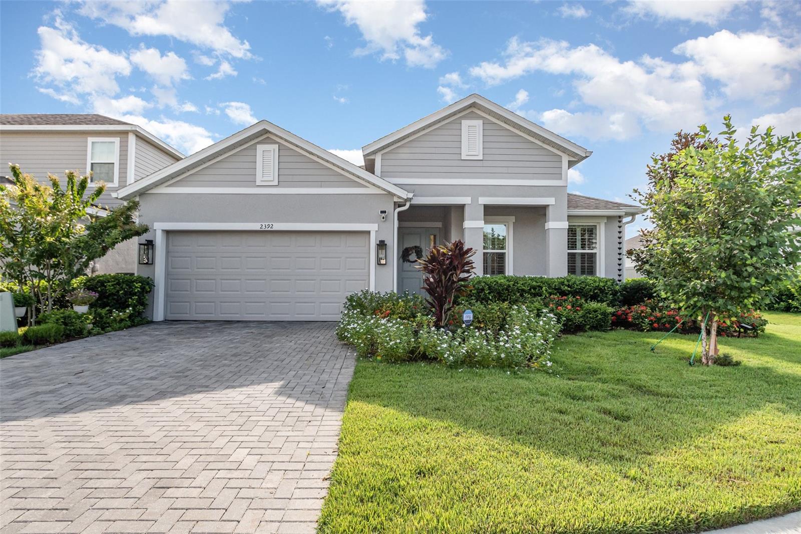 Better Than New in Summerbrooke! Upgraded 3-Bedroom + Den Margate Model Built in 2023
Why wait for new construction when you can move right into this beautifully upgraded home in Summerbrooke, one of Mount Dora’s most desirable communities! Built in 2023, this 3-bedroom, 2-bath Margate model also includes a flexible den—ideal as a home office, bonus room, or guest space—and offers 1,966 square feet of well-designed living space. With gas appliances, and loaded with thoughtful upgrades, this home stands out from the rest: Screened-in lanai with brick pavers for relaxing or entertaining, Pendant lighting in the kitchen, Ceiling fans in the den, living room, and lanai, Upgraded lighting in the primary bedroom, Gutters with a decorative rain chain, Plantation shutters on 10 windows, Custom shelving in the primary bedroom closet, Towel racks and toilet paper holders already installed in both bathrooms, Four TV wall mounts and a Ring doorbell for modern convenience. Stylish tile flooring in the main living areas pairs beautifully with cozy carpet in the bedrooms. The open-concept layout seamlessly connects the kitchen, dining, and living areas—perfect for both everyday living and entertaining. Outside, the landscaping has been tastefully upgraded with four additional trees, a large Japanese blueberry bush, and vibrant plantings such as Ixora Mauis, periwinkle, and bottlebrush shrubs—all adding privacy and curb appeal. Plus, a unique easement on the right-hand side of the property creates extra space between homes for added breathing room. Located in charming Mount Dora, you’ll enjoy life in one of Central Florida’s most beloved small towns. Mount Dora offers a variety of activities and attractions, including exploring its historic downtown, enjoying outdoor recreation, and experiencing its vibrant arts and culture scene. Visitors and residents alike love strolling through downtown’s unique shops, art galleries, and locally owned restaurants, or taking a relaxing boat tour on Lake Dora. Popular spots include the Modernism Museum, Renninger’s Antique Market, and the town’s many year-round festivals and events, such as the Mount Dora Arts Festival and the annual Christmas lighting celebration. With convenient access to Orlando, the Wekiva Parkway, and area attractions, Summerbrooke is the perfect place to call home. This Margate model is truly better than new—move-in ready and waiting for you to enjoy the Mount Dora lifestyle!