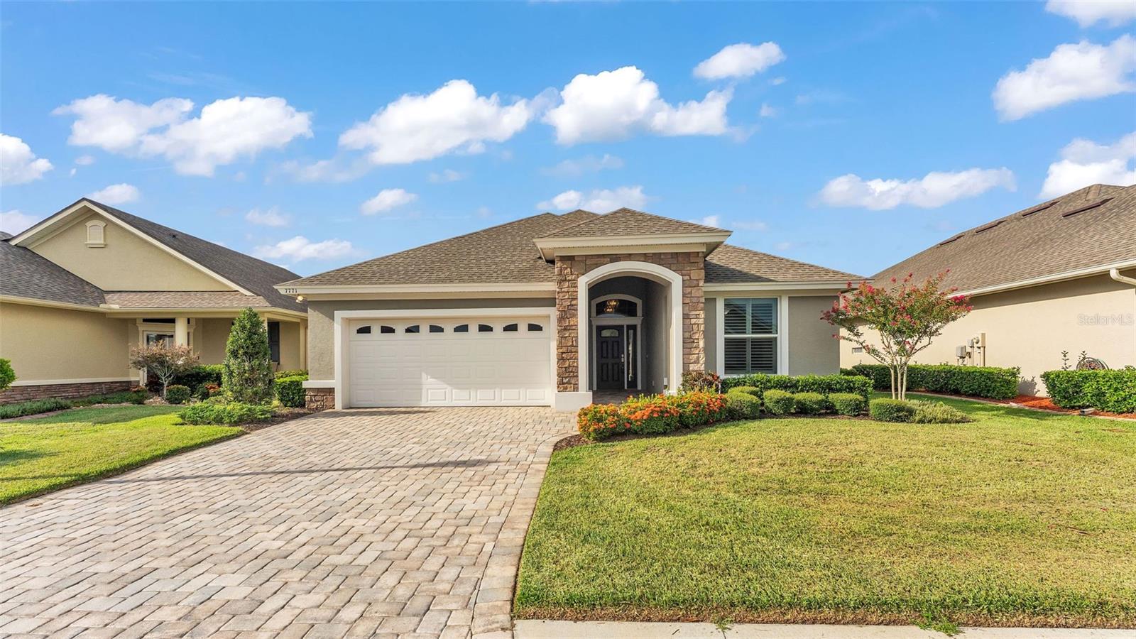 Welcome to the Good Life in Lake James! Looking for low-maintenance living with all the perks? This beautifully maintained Gibson III by ErnieWhite is nestled in the active 55+ gated community of Lake James in North Lakeland and it’s ready for you to move in and start living your best life. This 2-bedroom, 2-bathroom beauty also features a flexible bonus room perfect for a guest room, cozy den, office or your very own hobby hideaway. The open concept floor plan keeps everything light, bright, and easy to navigate. The chef’s kitchen is front and center with gorgeous wood cabinets, granite countertops, a spacious island, recessed lighting, and a pantry. Retreat to your sunny primary suite, complete with a spa-like en-suite bathroom featuring double sinks, a luxurious walk-in shower, private water closet, linen closet, and a huge walk-in closet. Your guests will love the split floor plan with the second bedroom tucked up front for added privacy. And when it's time to relax, the screened-in lanai is the perfect spot for morning coffee, afternoon iced tea, or an evening glass of wine. Now let’s talk about Lake James amenities! Enjoy a heated pool, clubhouse, fitness center, bocce ball court, walking trails, an 8-acre lake, and lots of community events such as potlucks and card games. Plus no mowing the lawn! Your monthly fee covers lawn care, edging, basic cable, and internet. Yes, that means more time for fun and less time doing yard work. Conveniently located just 4 miles from I-4, you’re close to shopping, restaurants, medical offices, and everything you need. Ready to kick back, relax, and enjoy the lifestyle you deserve? Call today to tour this immaculate home.