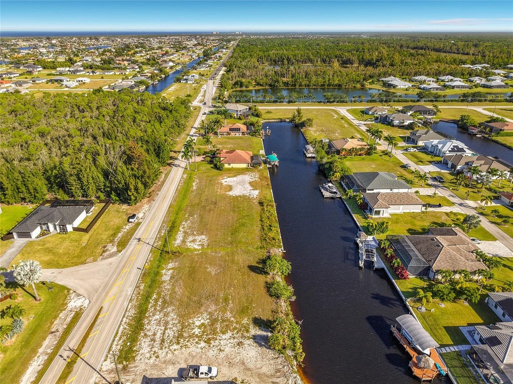 Photo of 2219 Old Burnt Store Road N, Cape Coral, FL 33993 (MLS # C7532614)