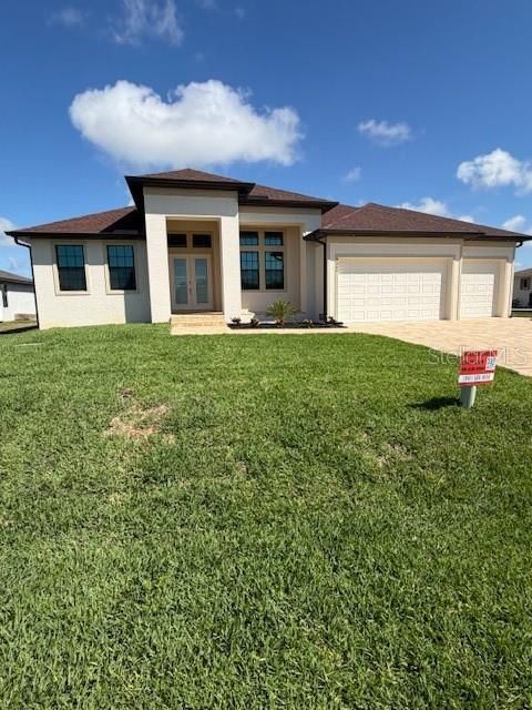 Photo of 9364 Miami Cir, Port Charlotte, FL 33981 (MLS # D6144914)
