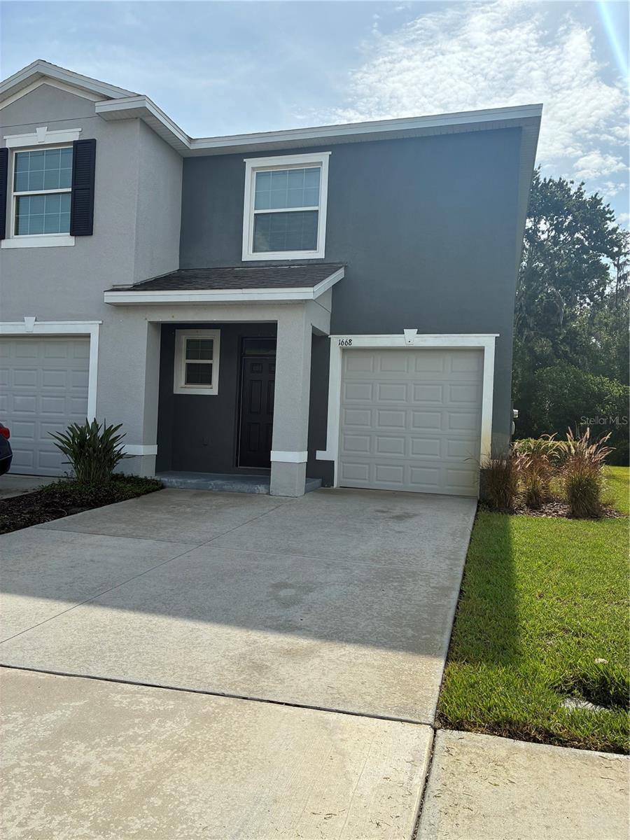 Welcome to this charming 2020-built home featuring 3 bedrooms, 2.5 bathrooms, and a 1-car garage. Downstairs offers an open-concept layout with a spacious living room, dining area, and a large kitchen with a center island that’s perfect for casual seating. A convenient half bath is located on the first floor, along with access to the screened-in porch—an ideal spot to relax and enjoy the natural surroundings. Upstairs, you’ll find all three bedrooms, plus a versatile flex space at the top of the stairs—perfect for a home office, play area, or cozy reading nook. The primary suite features a walk-in closet and a private en suite bath with an additional walk-in closet. The two secondary bedrooms each have generously sized closets and share a full bathroom. Freshly painted and move-in ready, this home sits in a cute and well-kept neighborhood just 15 minutes from shopping, dining, and everyday essentials. Come take a look—you’ll feel right at home, and it won’t last long!