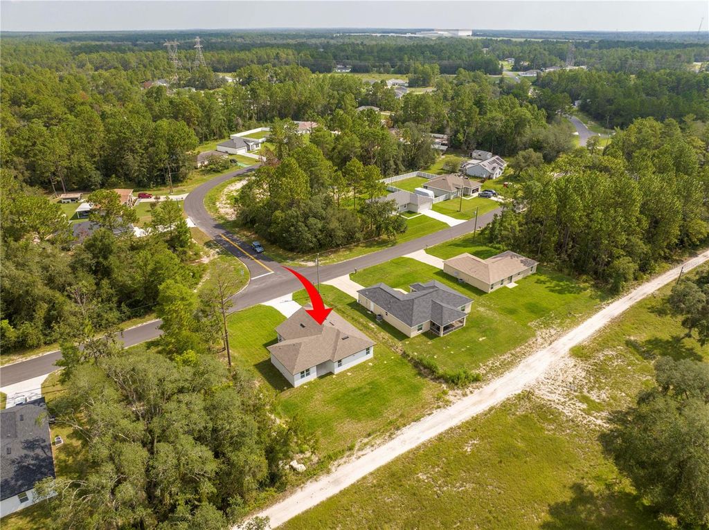 Photo of 6671 SW 151st Loop, Ocala, FL 34473 (MLS # O6346396)