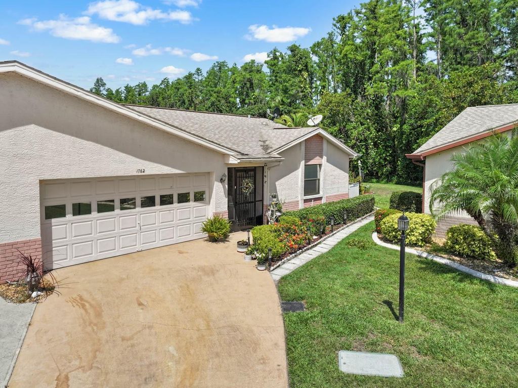 Photo of 1762 Atrium Drive, Sun City Center, FL 33573 (MLS # TB8388632)