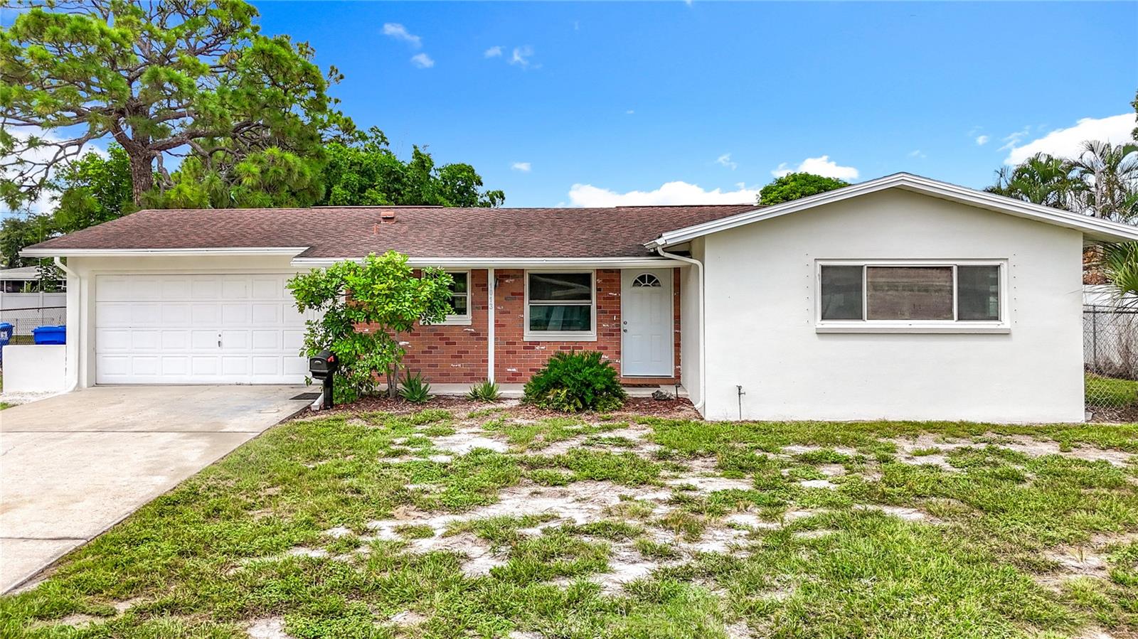Newly remodeled and move-in ready! This desirable split floor plan offers 3 spacious bedrooms, including a
private en-suite with its own entrance—perfect for in-laws, extended family, or rental income. The layout flows
into a modern kitchen and living space, with vinyl flooring and fresh finishes throughout.
Outside, enjoy a fully fenced backyard and a screened 12’x10’ patio—ideal for pets, and entertaining.
The two-car attached garage and extended 25+ ft driveway provide ample parking. Systems include gas heat,
a gas stove, and a gas water heater for efficiency and reliability.
Located in Flood Zone X, the home sits just minutes from the Skyway Bridge, beaches, and vibrant downtown
St. Petersburg. Whether commuting or enjoying Florida living, this home offers both convenience and comfort.