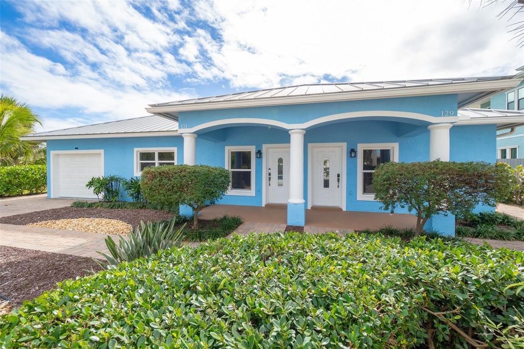 Photo of 131 Harding Avenue #131 &amp; 129, Cocoa Beach, FL 32931 (MLS # O6369284)