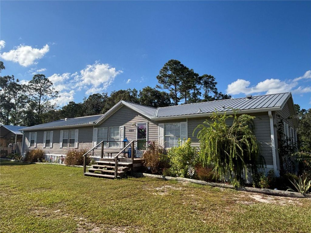 Photo of 8260 SE 175th Court, Ocklawaha, FL 32179 (MLS # OM712012)