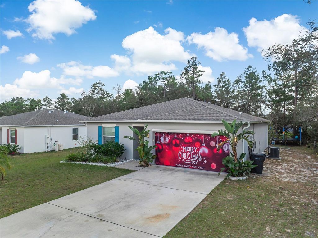 Photo of 328 Hibiscus Drive, Poinciana, FL 34759 (MLS # O6374718)