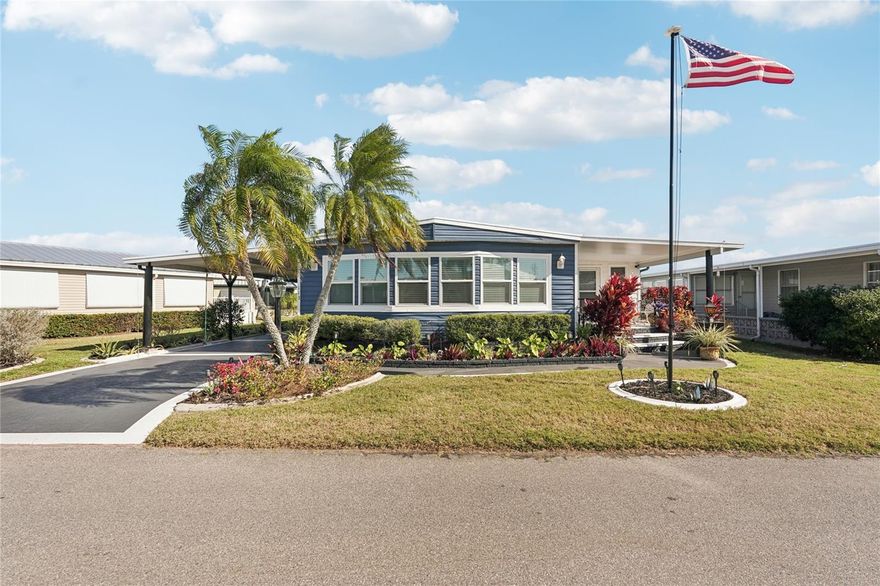 Welcome to Kings Gate Club, a spectacular 55+ gated cooperative in beautiful Nokomis, Florida! This home was remodeled with over $150,000 in upgrades, and no expense spared. A full list of items is available in the MLS attachments; just ask your agent to share it with you! Even approaching the home, you’ll know this one is special when you see the pristine landscaping, fresh paint, and new windows. One of the most defining features of the home is the open floor plan, where walls were taken down to allow the kitchen, living room, and dining area to flow together into one open living space. The laundry was moved to a closet in this living space, and there is also a mud room type space when you enter the door. The subfloors were replaced throughout the home, and new luxury vinyl plank was laid down. To add to the luxuriousness, crown molding and taller base molding were added. The kitchen has granite countertops and new stainless steel appliances, including a raised dishwasher and ice maker. There is drywall and recessed lighting throughout the home. The guest bedroom has an ensuite bathroom, with a Jack and Jill configuration, and a barn door to separate it from the main living space. The master suite is at the rear of the home, and features an ensuite bathroom with dual vanities and walk-in tile shower, and remote controlled blinds on the windows! The Florida room is completely enclosed with window AC units, adding to the overall heated and cooled living space. The sliding glass door leading to the screen porch is a triple slider, allowing the outside to come in, and there is a deck out back, leading down to the pond. Under the carport, there is a huge storage shed! Furnishings are negotiable! Kings Gate Club is just minutes to beaches, shopping, restaurants, Sarasota Memorial hospital and I-75, yet hidden from public view. Even Siesta Key beach, which is ranked #2 beach in the US and 14th in the world, is less than 17 miles away! Among the many amenities that this community offers is the oversized swimming pool with lap lanes, 24-hour fitness center, saunas, community hot tub, game and craft rooms, woodworking shop, pickleball, tennis, bocce ball and shuffleboard courts for the sport enthusiast. Included in your HOA fees of only $438 a month (paid quarterly) are over 200 cable channels and state-of-the-art fiber optics internet, mowing, garbage, and water.