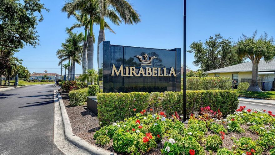 UPGRADES ABOUND in this immaculate, low maintenance, energy efficient villa in Mirabella at Village Green.  Built in 2016 by Synergy Building Corp, Mirabella sits 22 ft above flood plain and is engineered to withstand 155 mph winds providing peace of mind during hurricane season.  Just minutes from Anna Maria Island, Mirabella is  an award winning LEED PLATINUM 55+ community designed for efficient, healthy living with reclaimed irrigation water, low flow plumbing, and high-performance MERV 8+ HVAC w/UV filtration.  The bright, modern 1,525 sq. ft. interior includes 2 bedrooms + den, quartz countertops, high ceilings, 8 ft. doors, and gorgeous COREtec LVP flooring. Recent upgrades also include an impact triple slider, remote blind, upgraded lighting, and 2025 RANGE, MICROWAVE, DISHWASHER, DRYER, ADA PRIMARY TOILET, AC DUCT CLEANING, AND C02-SMOKE DETECTORS.  The Refrigerator + Washer were replaced in 2022 and its epoxy-finished two car garage adds a clean, polished touch you will appreciate every day. Conveniently located 5 miles from Anna Maria Island and within 1.4 miles of Blake Medical Center, Mirabella’s community amenities include: pool and spa w/ clubhouse, fitness center, dog park, pickleball, sidewalks, park, playground, underground utilities, and great neighbors.