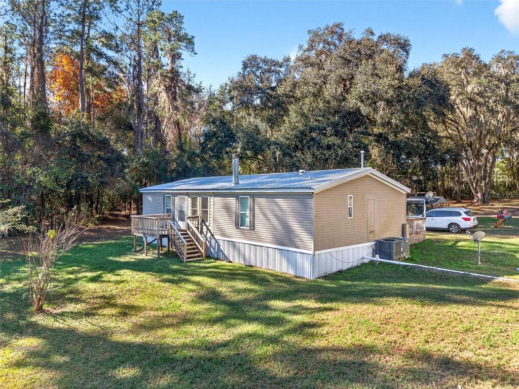 Photo of 15340 NW 65th Avenue Road, Reddick, FL 32686 (MLS # OM715194)