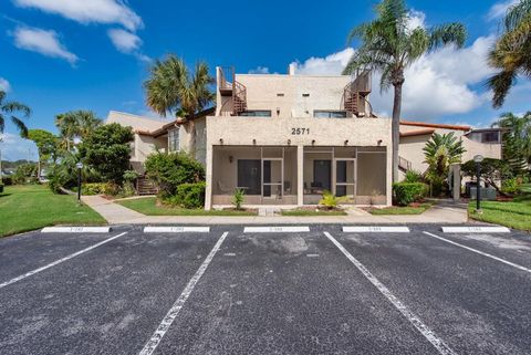 Photo of 2571 Cyprus Drive #1-102, Palm Harbor, FL 34684 (MLS # TB8434490)