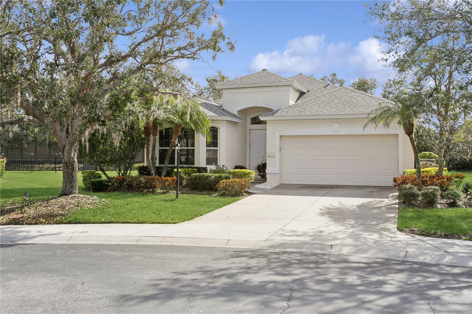 Tucked away on a quiet cul-de-sac in a gated community, this stylish, updated residence offers the perfect blend of design and livability. A light-filled great room with tray ceiling and tile floors throughout sets a bright, airy tone, complemented by an open-concept layout.
The remodeled kitchen impresses with a large quartz island, wood cabinetry, under-cabinet glass block windows, and a cozy dining nook. The primary suite includes two walk-in closets and a fully updated bath, with sleek finishes found throughout both renovated bathrooms. Outside, enjoy a private backyard retreat perfect for relaxing or entertaining.
Recent upgrades include a new roof (2022), AC (2019), and water softener.
Community perks include two resort-style pools (one with lap lane and hot tub, the other family-friendly with splash area), a fitness center, tennis courts, walking trails, and outdoor kitchens.
Located minutes from UTC Mall, Benderson Park, Whole Foods, and just a short drive to Downtown Sarasota, St. Armands Circle, and the world-class beaches of Siesta Key and Longboat Key.
