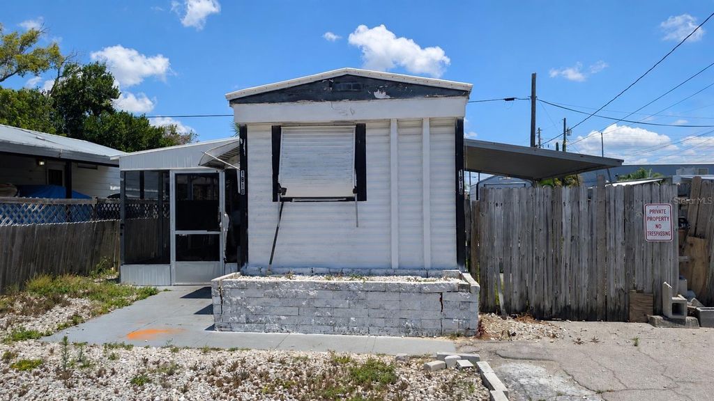 Photo of 1810 Holiday Drive, Holiday, FL 34691 (MLS # A4694206)