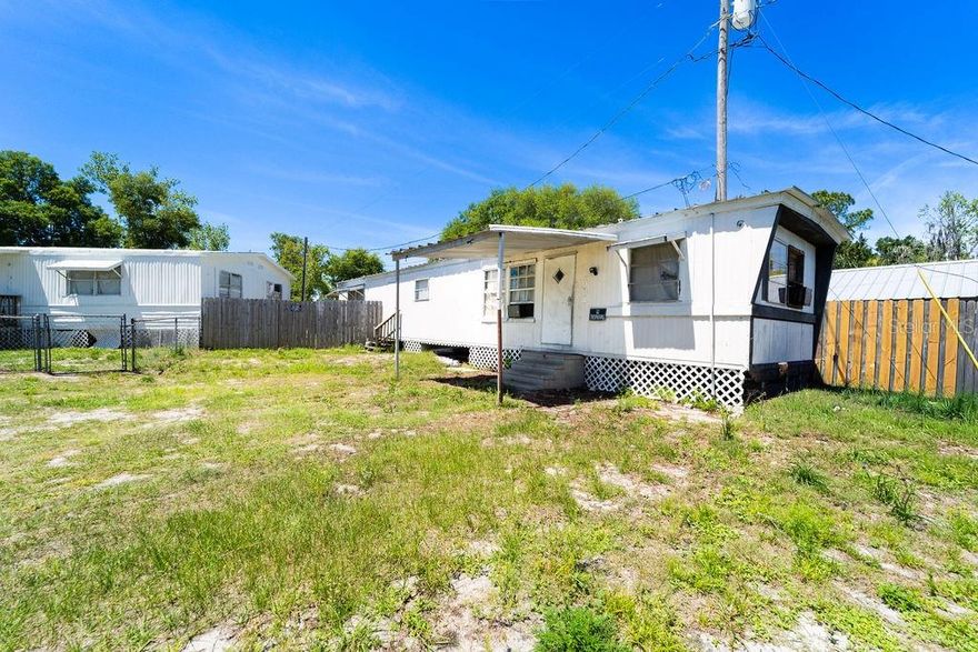 Two homes for the price of one. Double Wide is 4 bedrooms with 2 bathrooms. It rents for $1200 a month. The Single wide has 2 bedrooms and 1, 1/5 bathroom. It rents for $700 a month. Property is zoned MH5 and does not require flood insurance. Not in a mobile home community. No lot rent needed. Properties need TLC.