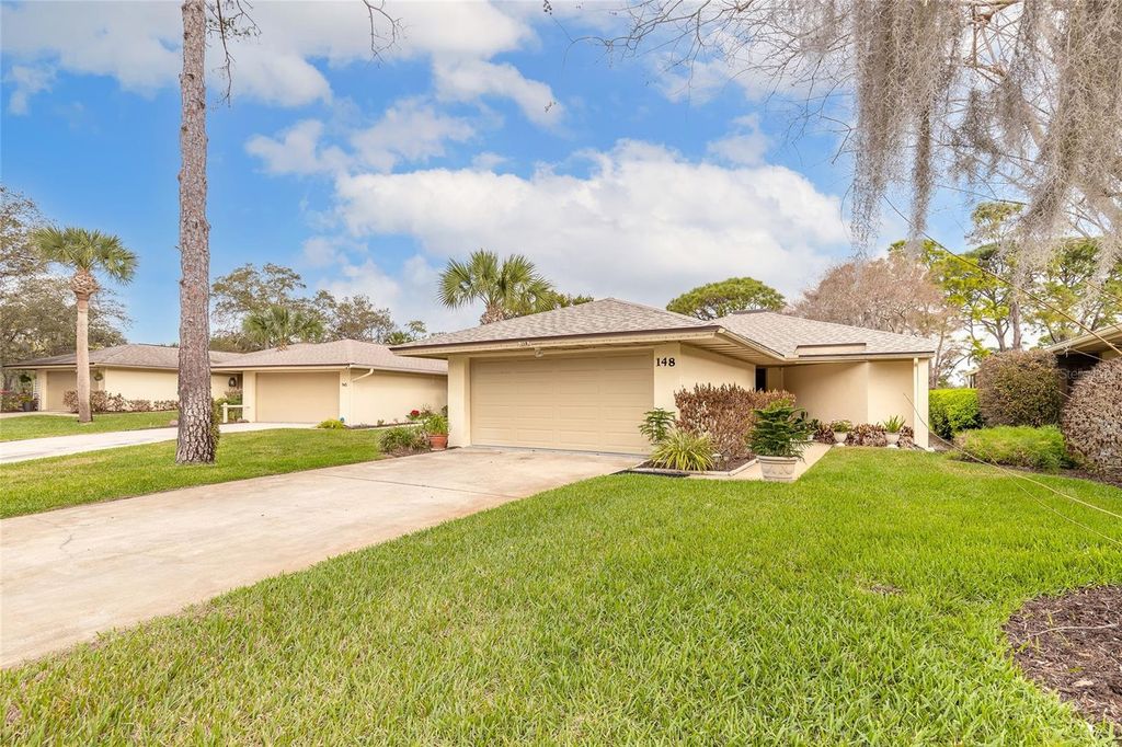 Photo of 148 Turnberry Circle, New Smyrna Beach, FL 32168 (MLS # V4947805)
