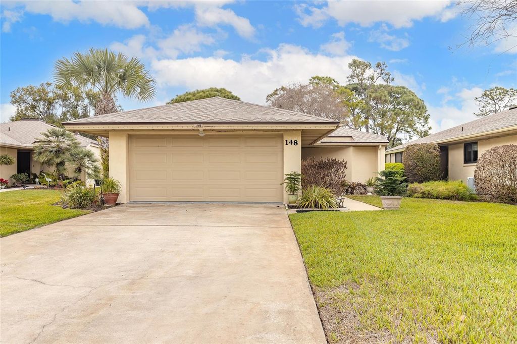 Photo of 148 Turnberry Circle, New Smyrna Beach, FL 32168 (MLS # V4947805)