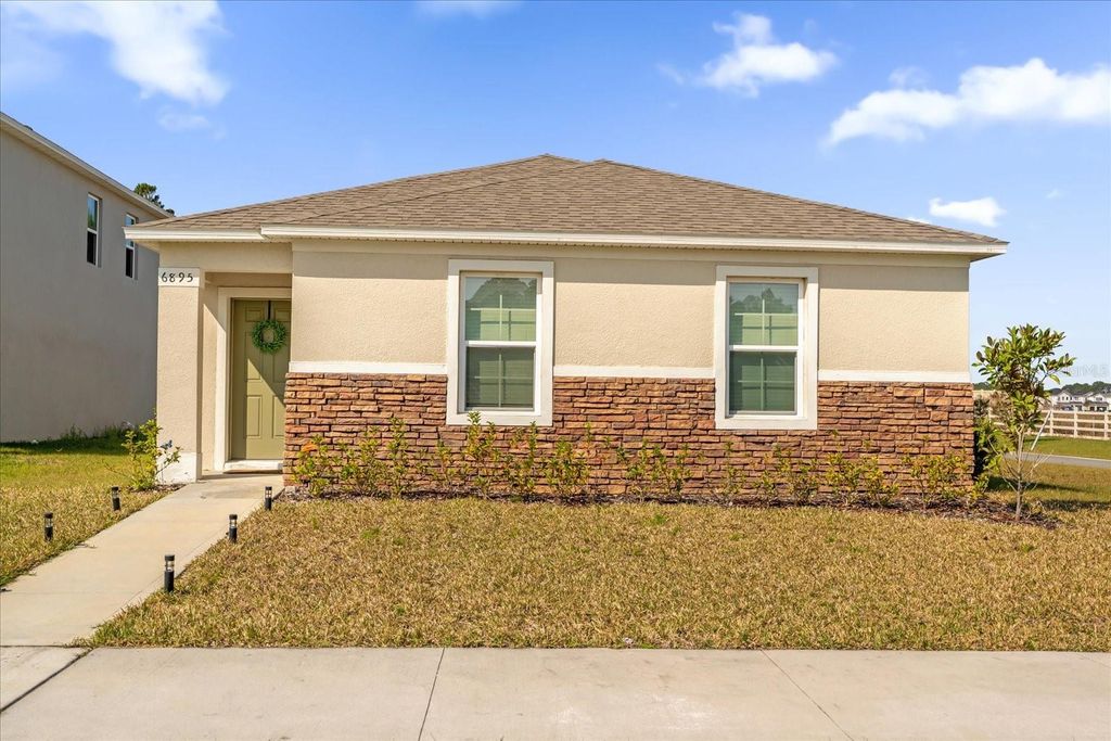 Photo of 6895 Botanic Boulevard, Harmony, FL 34773 (MLS # O6366997)