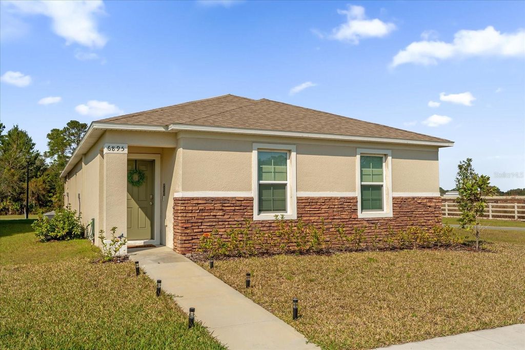 Photo of 6895 Botanic Boulevard, Harmony, FL 34773 (MLS # O6366997)