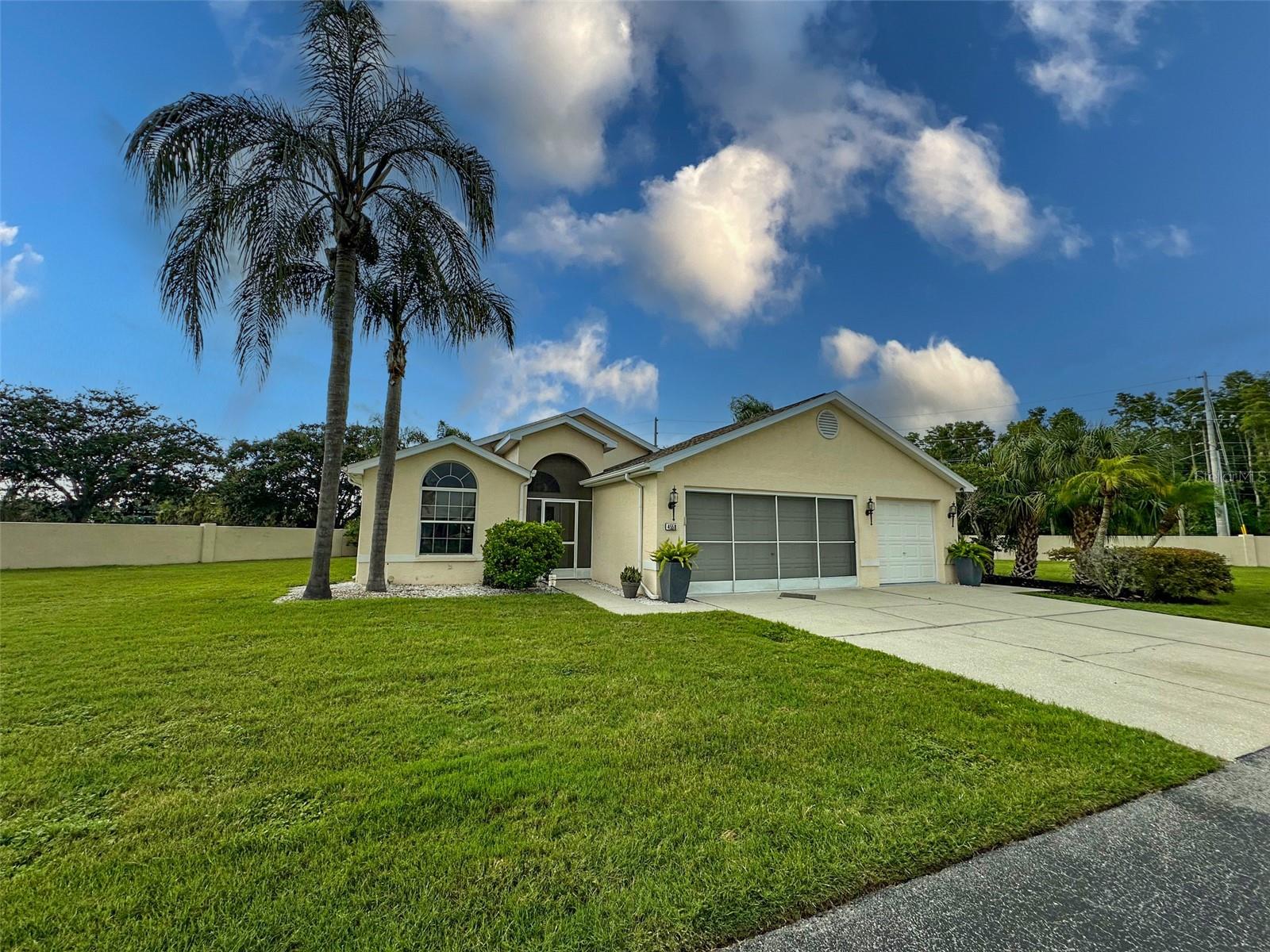 This 3 bedroom home in gated community in New Port Richey had been beautifully upgraded and redesigned. It could easily be featured in H&G magazine. No CDD. Stunning primary bathroom. Large tiles. Designer sinks and shower. Amazing kitchen features. On oversized lot. 3 car garage. In-ground pool, screen lanai. Pool heater. New pool filter. Large den next to swimming pool. Available propane. Two big propane tanks. There's generator in case you'd lose power. New roof in 2021. Ne A/C in 2023. House never flooded. Two community pools available. Ground maintenance provided by HOA. Also cable TV included in HOA fees. House presents like a showcase. Only about 30 minutes to Tampa International Airport. Close to all major roads, shopping, car dealerships, medical facilities, and Gulf of America, restaurants, water sports, golf courses. A must see house. Make an appointment to see it and you'll love it. It could be the ne xt place you'll call home. Enjoy Florida living at its best.