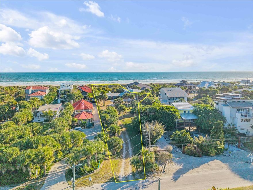 Discover a rare opportunity to own a true oceanfront estate in the highly sought-after North Beach area of New Smyrna Beach. Situated on an oversized 0.82-acre lot spanning approximately 35,925 square feet, this exceptional property offers privacy, space, and endless potential along one of the area’s most desirable stretches of coastline. The residence features 5 bedrooms, 5.5 bathrooms, and nearly 5,000 square feet of living space under air, creating the ideal setting for a luxury coastal retreat, multigenerational getaway, or legacy family estate. Originally built in 1960, the home has been thoughtfully updated with new windows, a full-house HVAC system, and a 2018 roof, blending timeless character with important modern improvements. The true value of this rare offering lies in the premier direct oceanfront location and the extraordinary size of the lot — a combination seldom available in today’s market. The expansive property presents a unique opportunity to design and build a custom three-story beachfront estate complete with separate guest or in-law living quarters, a private courtyard-style pool, and expansive indoor-outdoor living spaces tailored for entertaining and long-term family enjoyment. Whether preserved, renovated, or reimagined into a one-of-a-kind coastal compound, this property offers the chance to create a true generational beachfront estate in one of the most exclusive oceanfront settings in New Smyrna Beach.