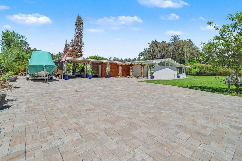 Photo of 2207 Poinsettia Lane, Deland, FL 32724 (MLS # O6444863)