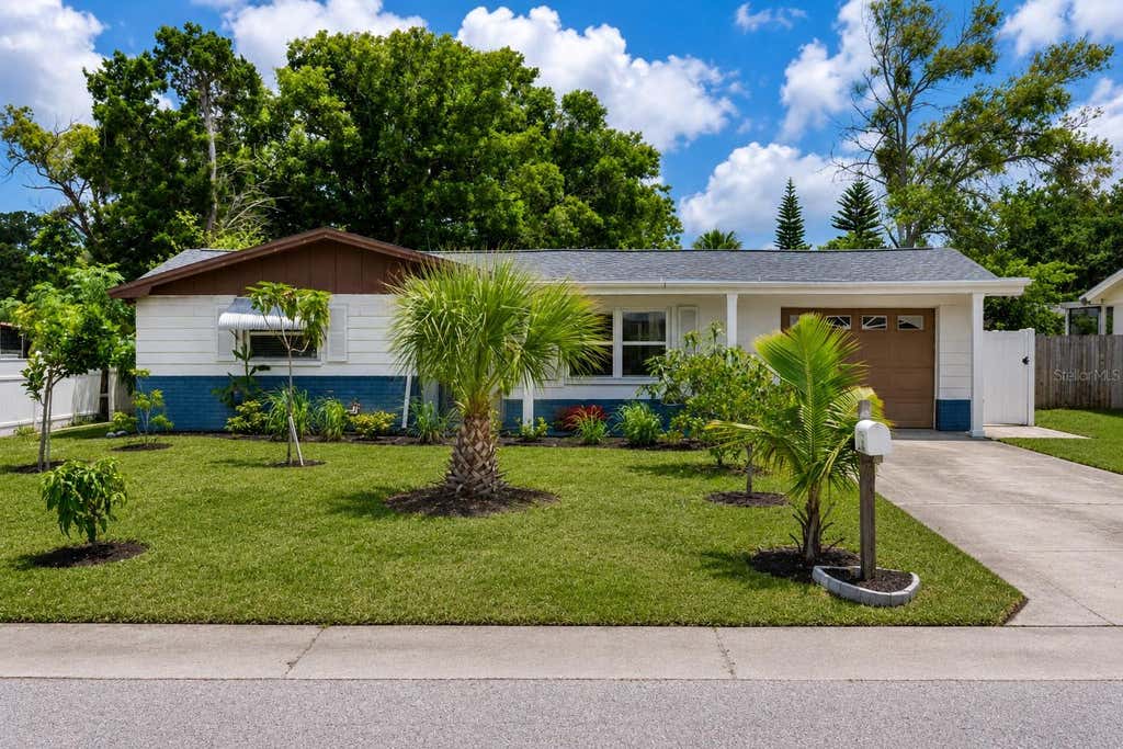 Photo of 3302 Rock Royal Drive, Holiday, FL 34691 (MLS # O6433449)