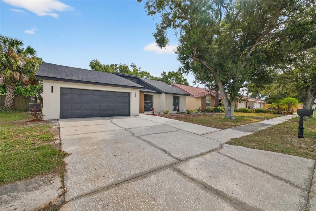 Photo of 7905 Timberlane West Drive, Tampa, FL 33615 (MLS # TB8443032)