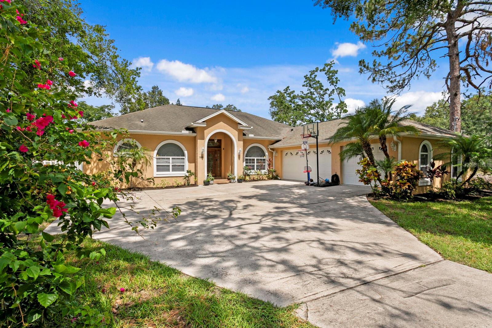 Stunning, contemporary 3-bedroom plus den/flex and three car garage on over 1/2 acre, walking distance to USF, synagogue, churches, stores, and under a 5 minute drive to Moffit, and other hospitals, clinics, parks, MOSI, I-75, and more, all in Tampa's beautiful Temple Terrace. Available for a 1-year lease starting August 1, 2025. This beautifully upgraded property boasts an open floor plan perfect for entertaining or family living, complete with granite countertops in the kitchen and bathrooms, all appliances included (including washer and dryer), and a spacious, fenced backyard ideal for family activities or pets (negotiable). The home features a thoughtful split-bedroom design, highlighted by a luxurious owner’s suite with a modern bathroom and walk-in closet, alongside generously sized additional bedrooms and a flexible den that can serve as a home office or an extra bedroom. Perfectly located within walking distance to the University of South Florida (USF) and a nearby synagogue, and less than a 5-minute drive to Moffitt Cancer Center and AdventHealth hospitals, this home is just 2.5 miles from I-75 for easy commuting. Combining upscale finishes, ample space, and an unbeatable location, this move-in-ready Temple Terrace gem is a perfect choice, ready for you on August 1, all professionally managed for a premium rental experience. No viewing on Saturdays.