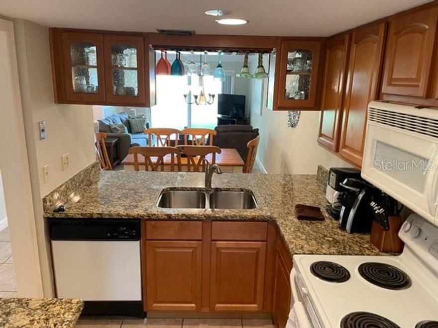 Updated convenient ground floor unit! Fantastic views of the ocean and the lush courtyard at Point East Condominium.  The unit features 2 newly updated bathrooms, updated kitchen, tiled throughout, new AC 2023 and a very unique ceiling in the living area and bedrooms.  The unit is being sold completely furnished. ;Water: City